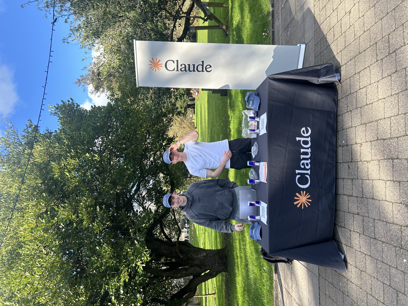 Club members at the Claude stand on campus